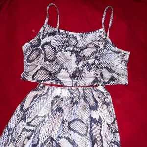 Matching snake skin skirt set.